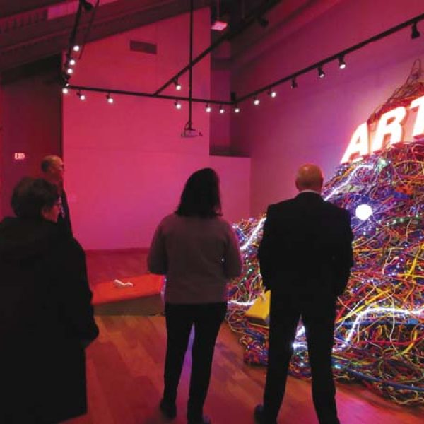 Fulton-Montgomery Community College Board of Trustees visit the newly renovated Perrella Art Gallery located in the Visual Arts and Communications Building on Thursday. (The Leader-Herald/Ashley Onyon)