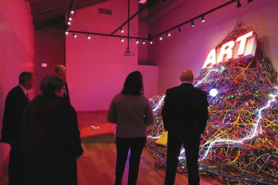 Fulton-Montgomery Community College Board of Trustees visit the newly renovated Perrella Art Gallery located in the Visual Arts and Communications Building on Thursday. (The Leader-Herald/Ashley Onyon)